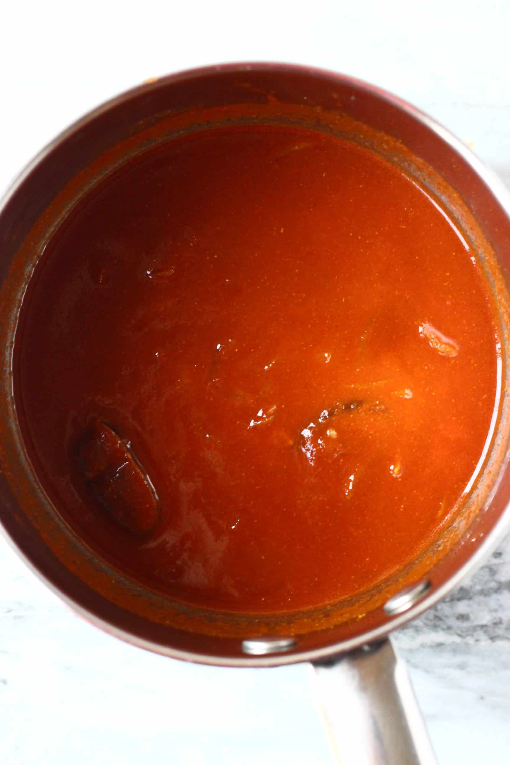 Vegan homemade BBQ sauce ingredients in a silver saucepan