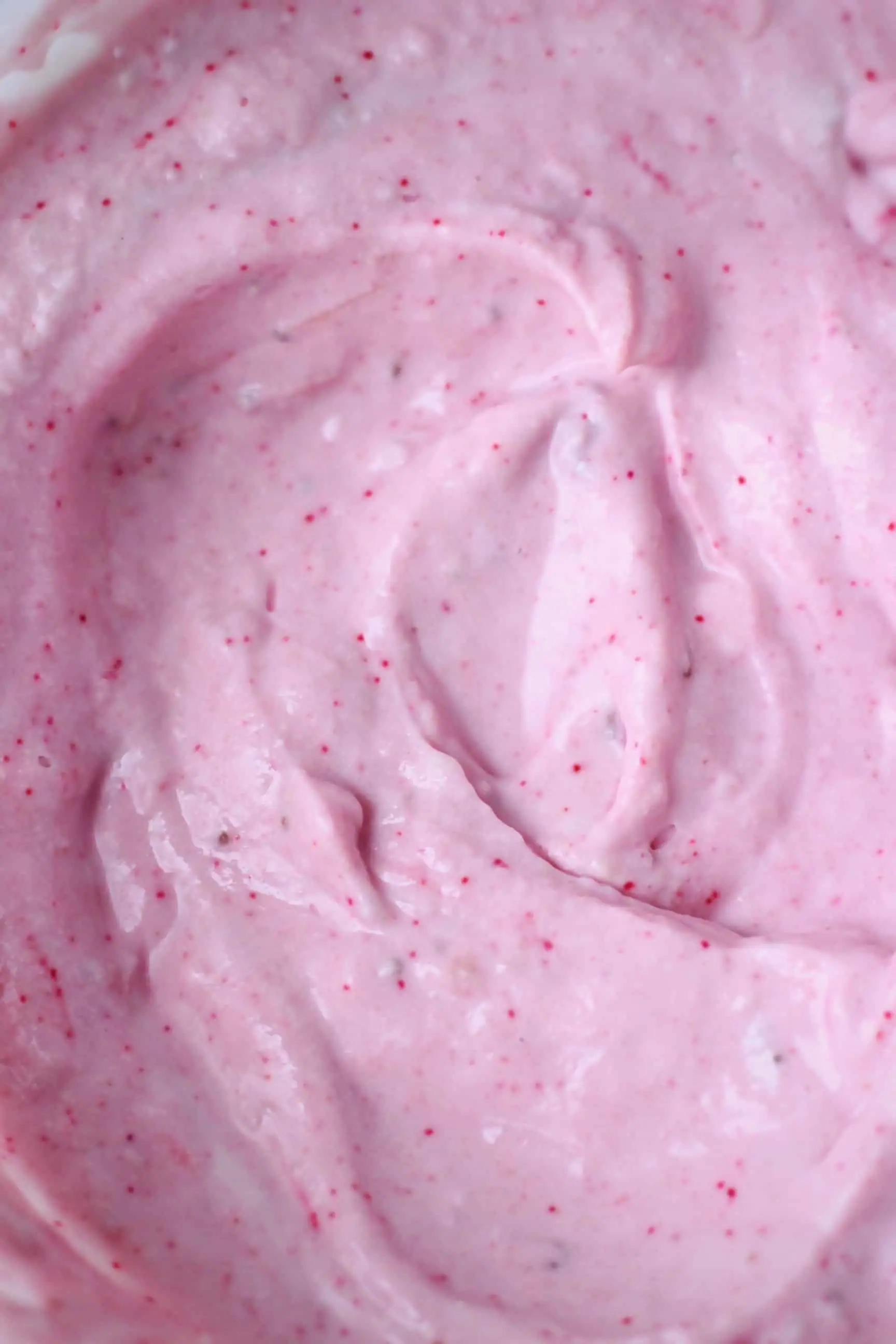 Vegan strawberry frosting in a bowl