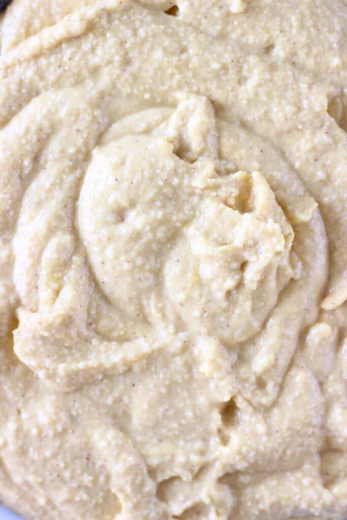 Photo of orange sponge cake batter in a mixing bowl