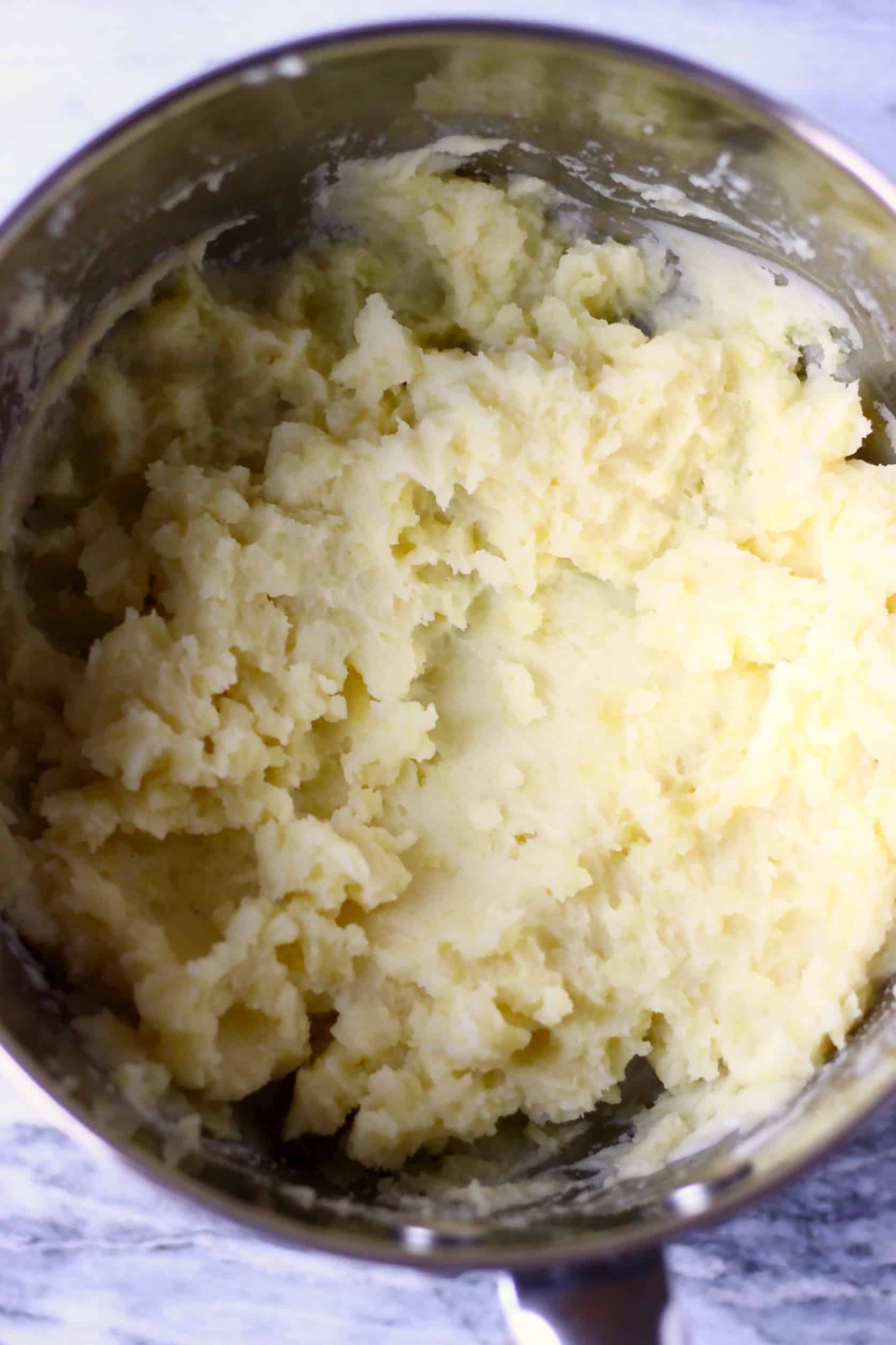 Creamy vegan mashed potatoes in a pan