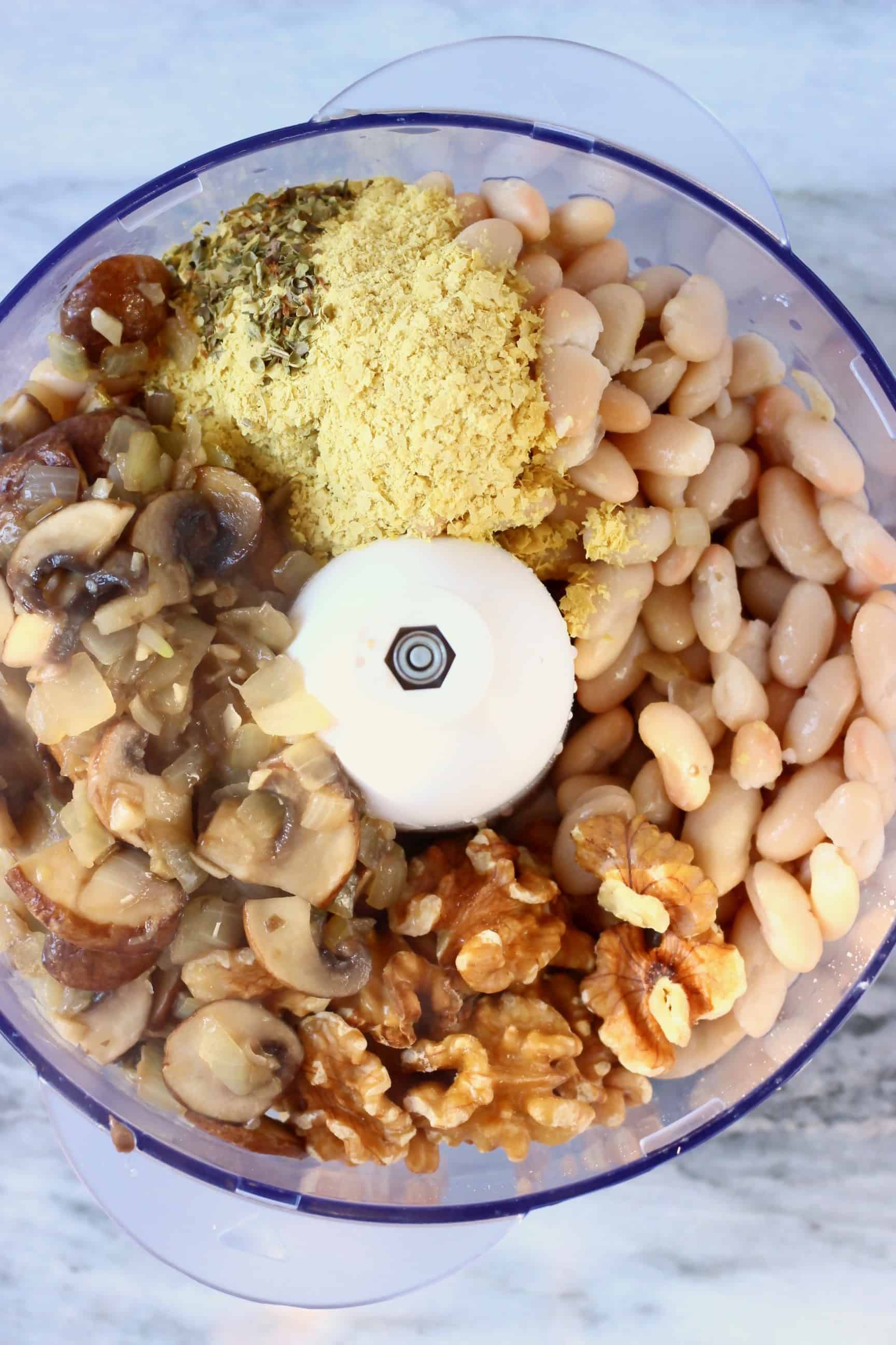 Fried onions, mushrooms, white beans, herbs and spices in a food processor