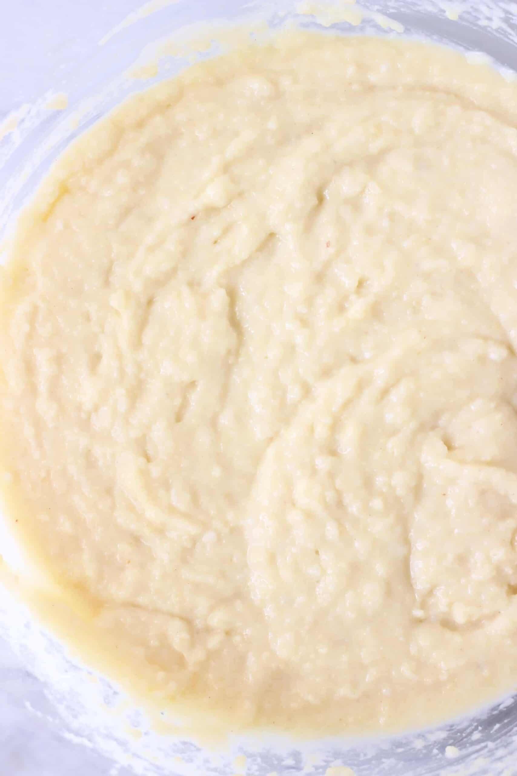 Vegan apple bread batter in a mixing bowl