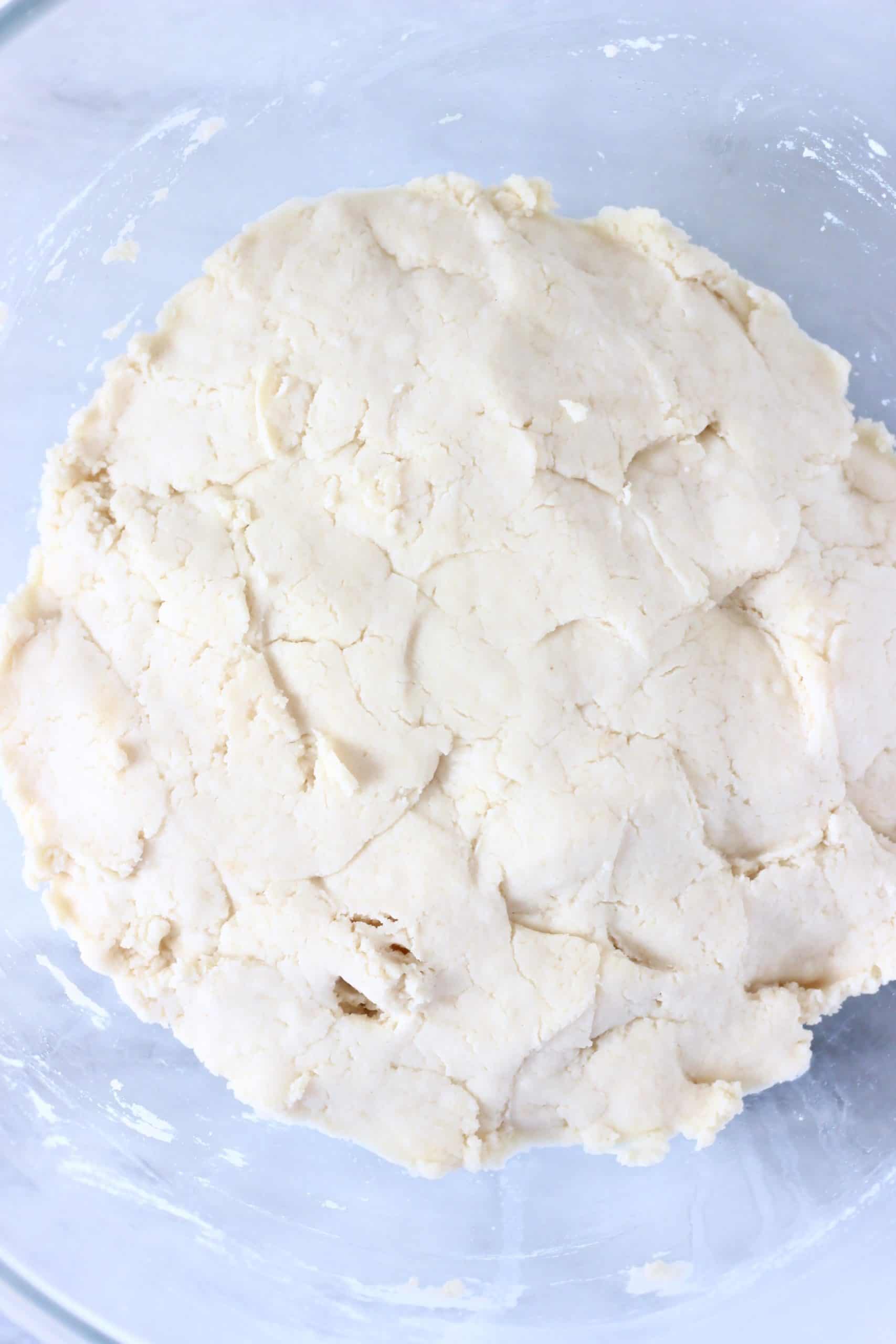 Raw gluten-free vegan cinnamon roll dough in a bowl