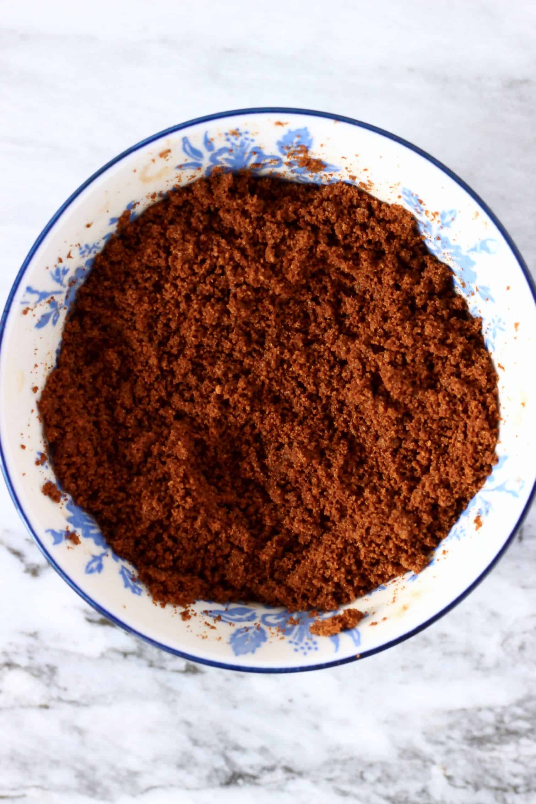 Cinnamon, coconut sugar and coconut oil mixed together in a bowl