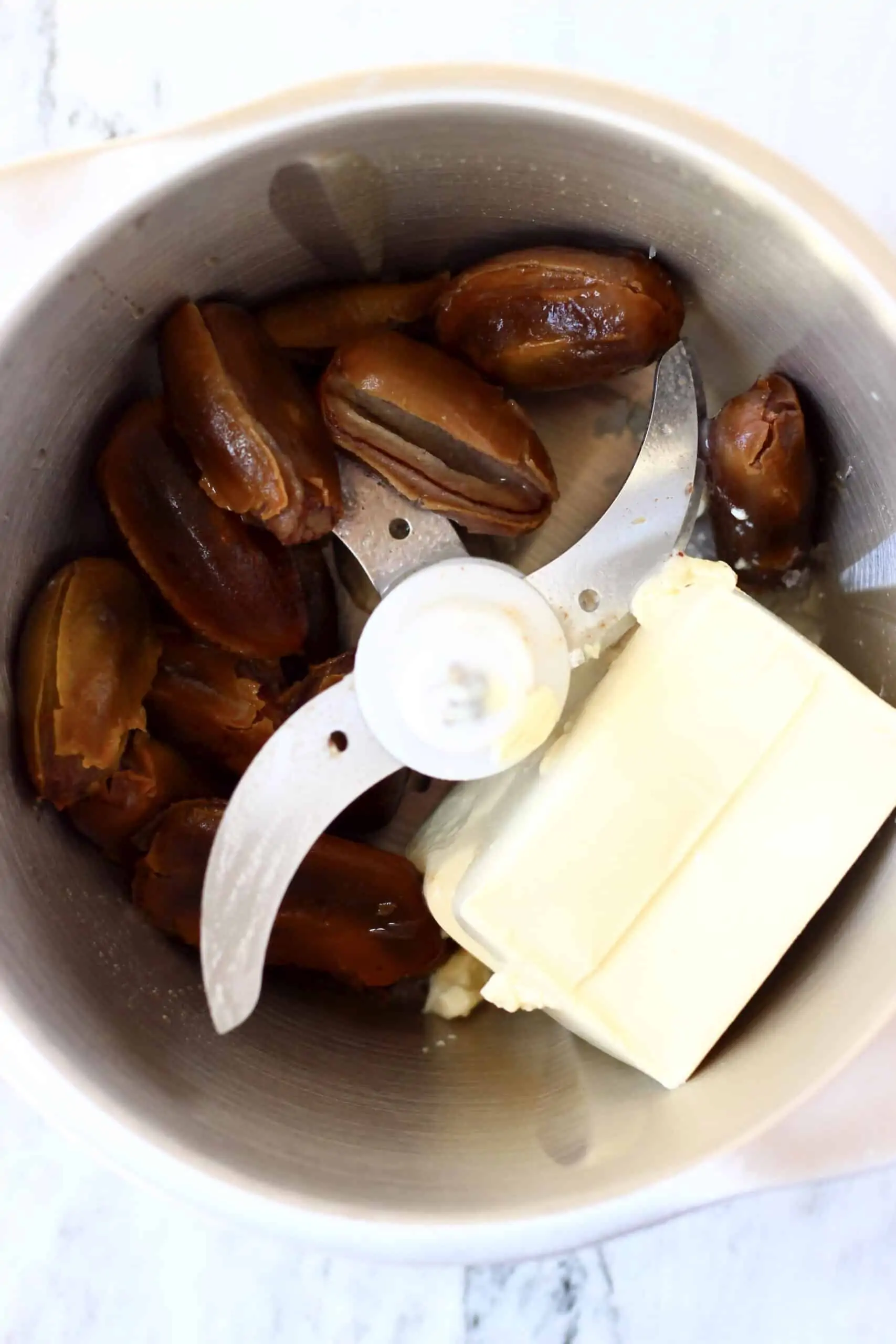Dates, silken tofu, salt and almond milk in a food processor