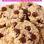 A pile of gluten-free vegan oatmeal chocolate chip cookies on a plate