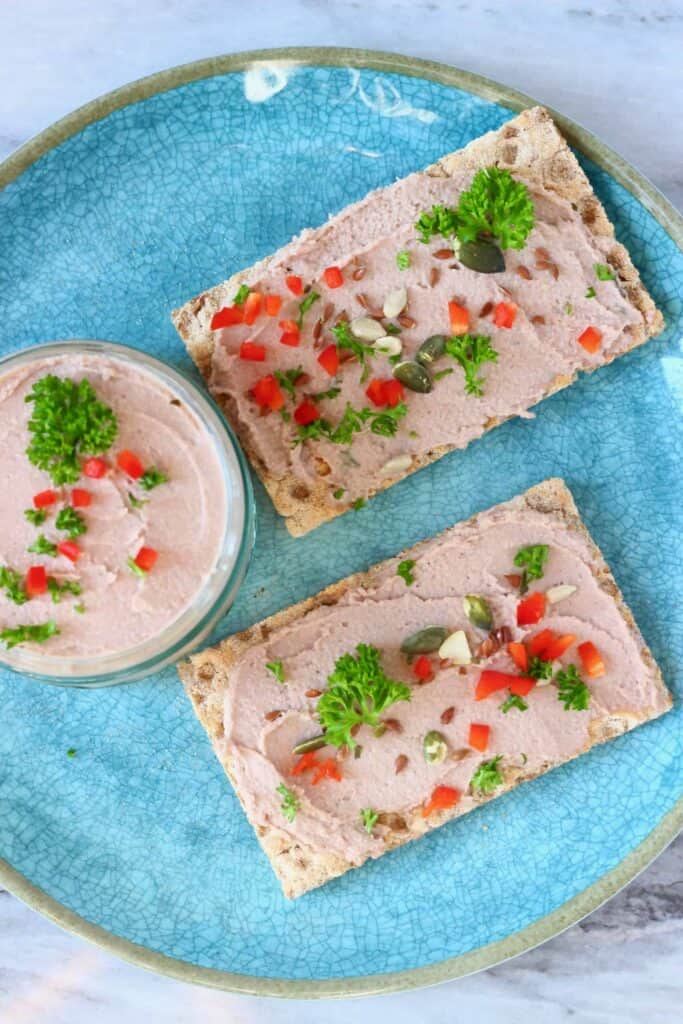 vegan mushroom pate on a plate with crackers.