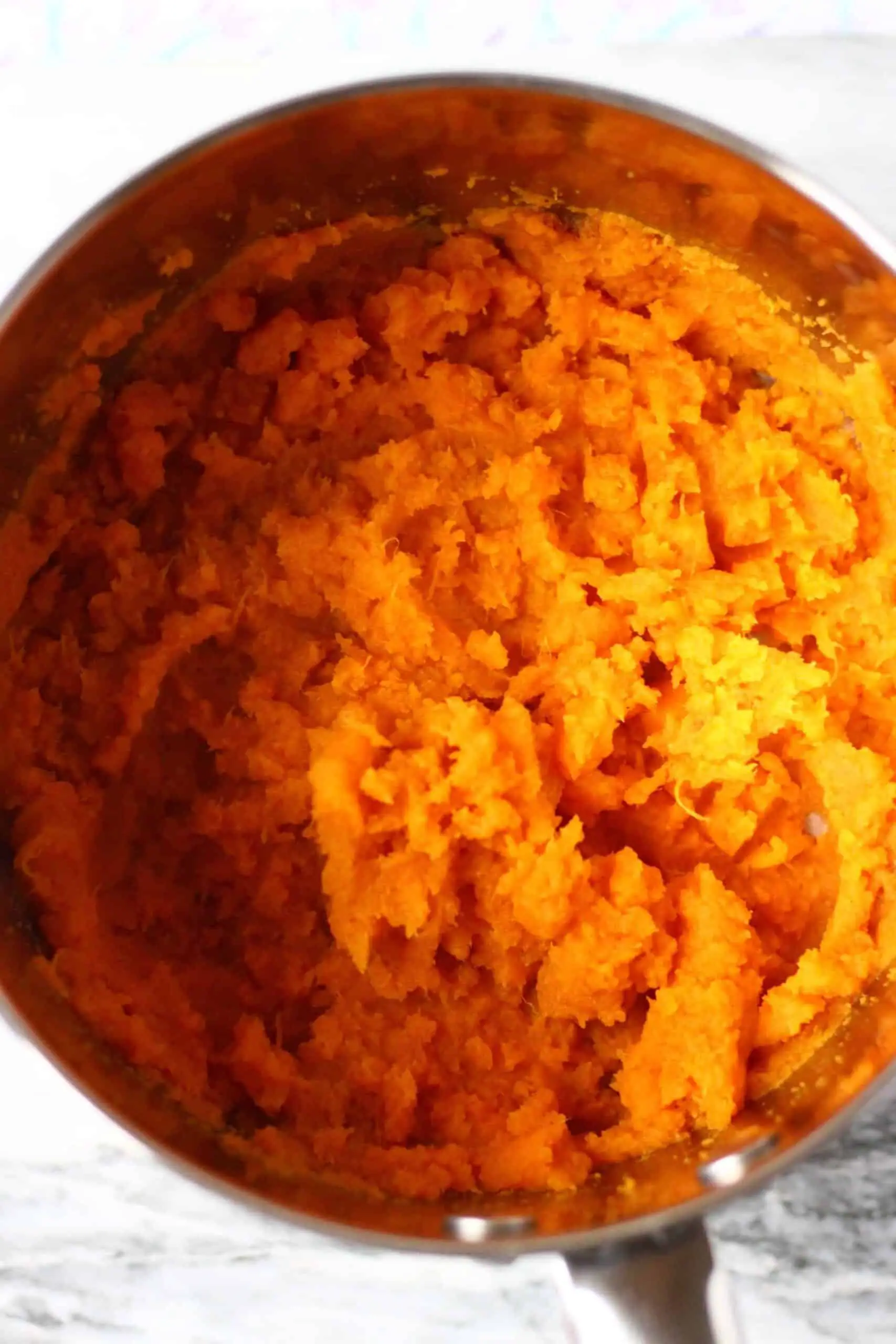 Mashed sweet potatoes in a pan