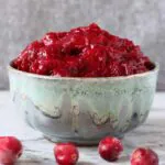Sugar free cranberry sauce in a bowl on a marble slab