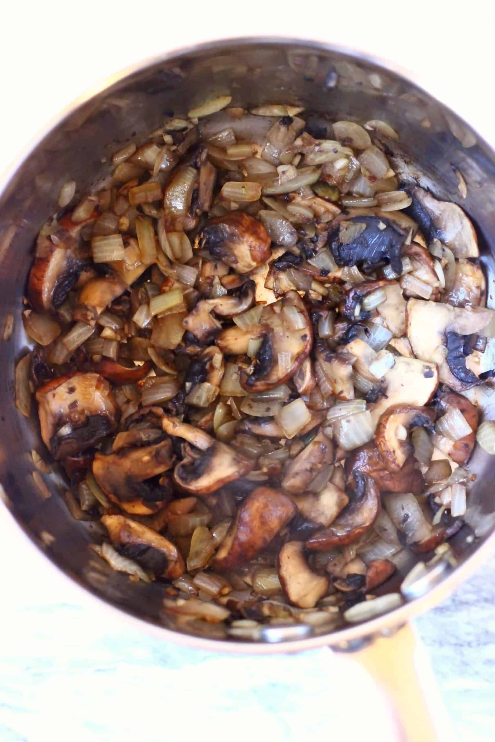 Sliced mushrooms in a pan