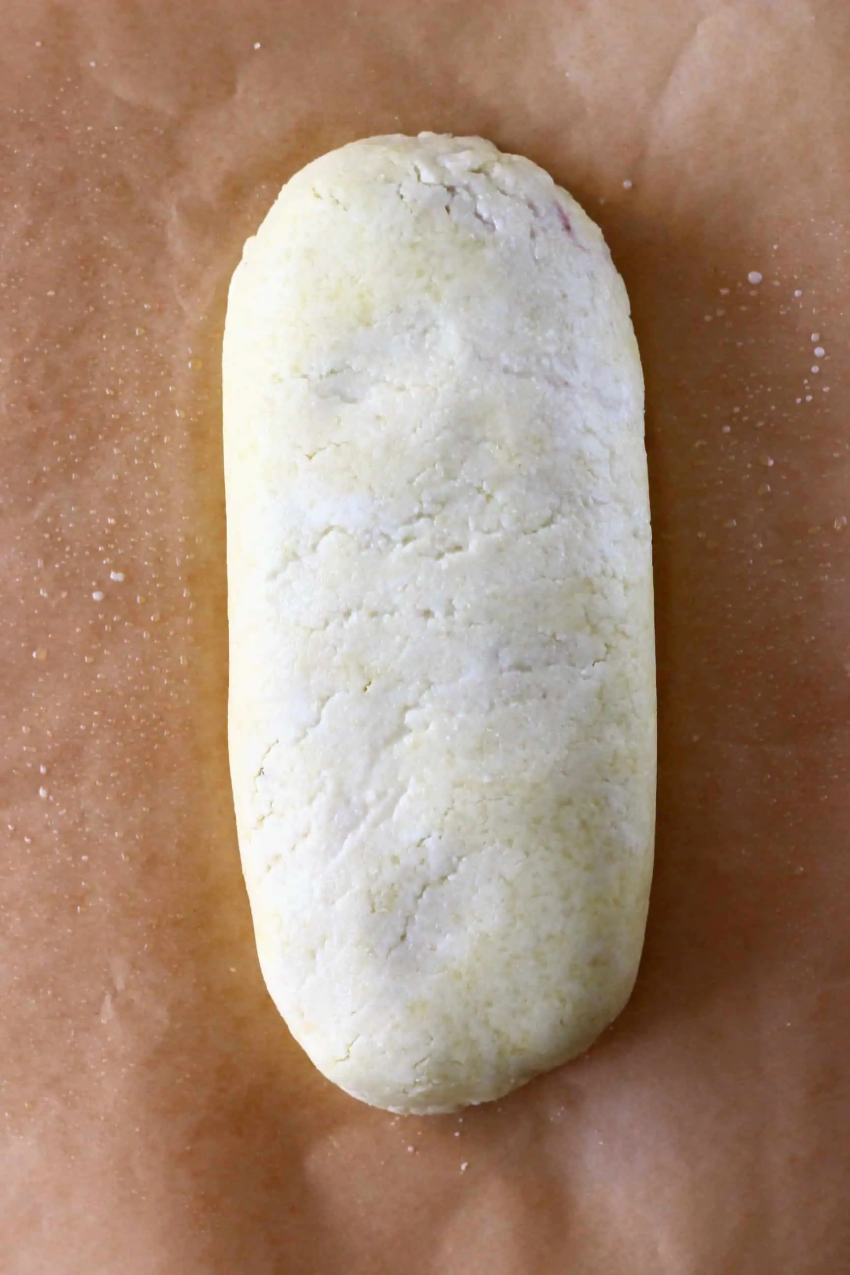 A raw vegan wellington on a sheet of  baking paper