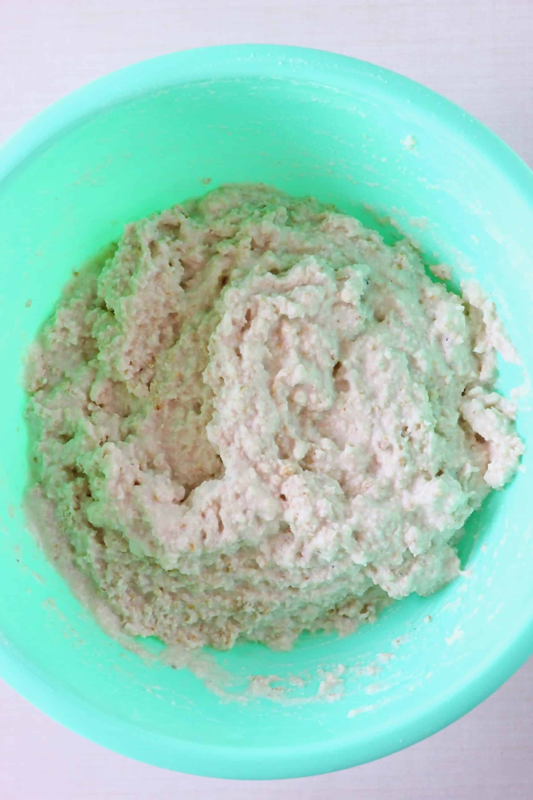 Raw gluten-free vegan oat bread dough in a bowl 