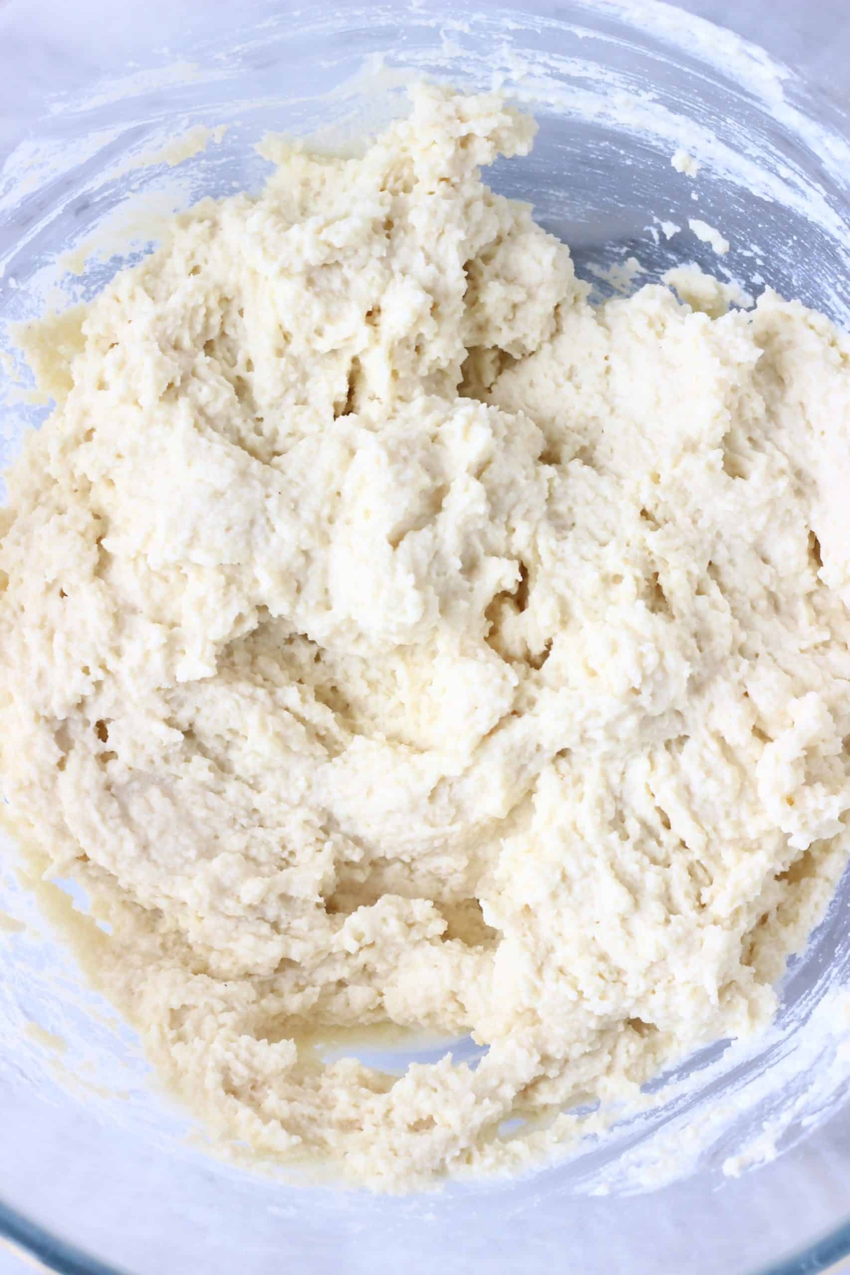 Raw coconut flour bread batter in a glass bowl