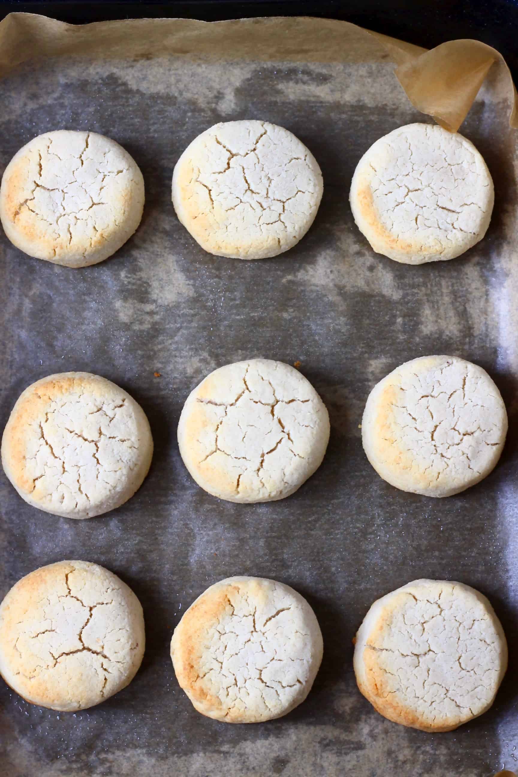 Nine gluten-free vegan scones on a baking tray lined with baking paper
