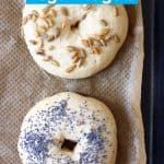 Two bagels on a sheet of brown baking paper