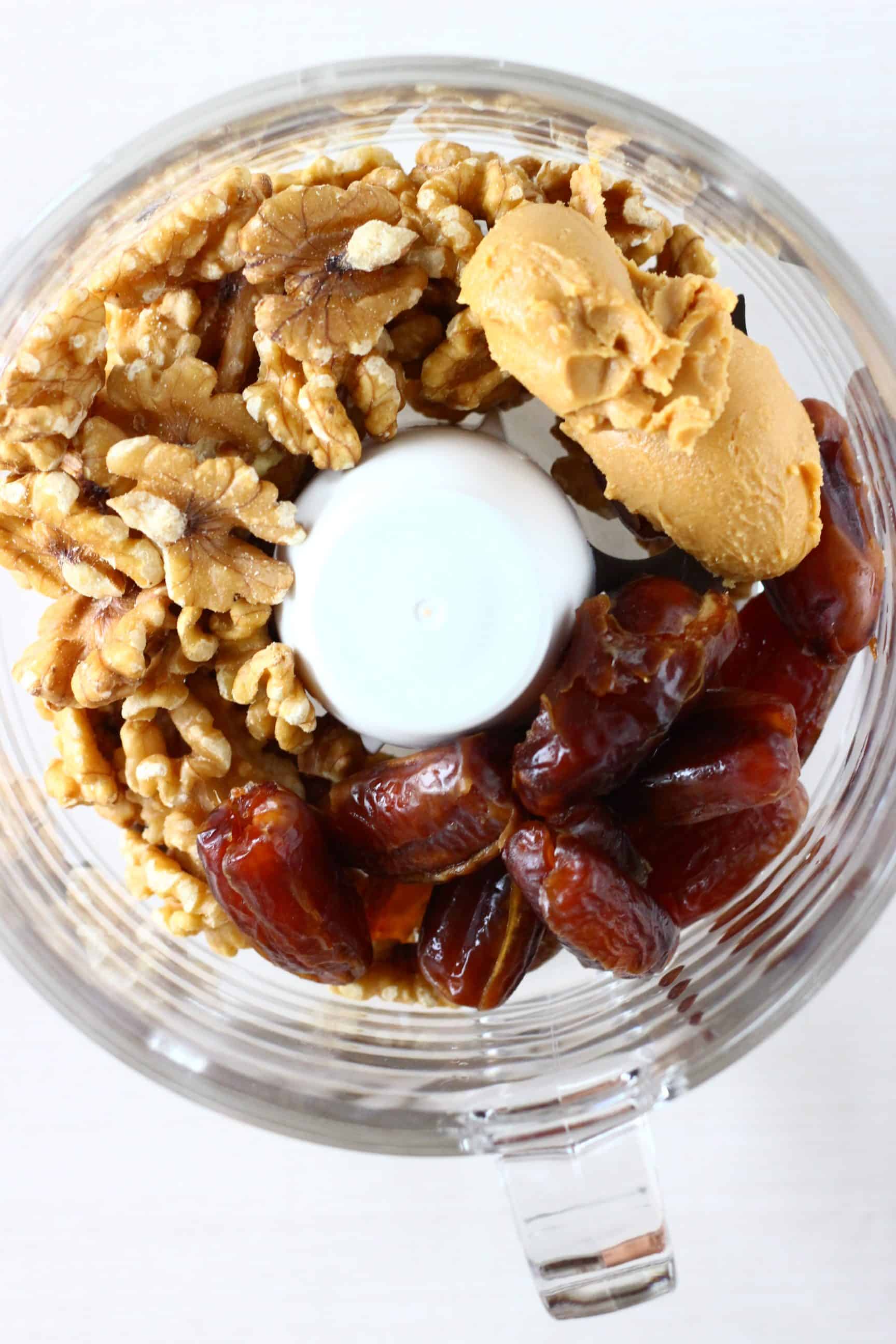 Walnuts, dates and peanut butter in a food processor