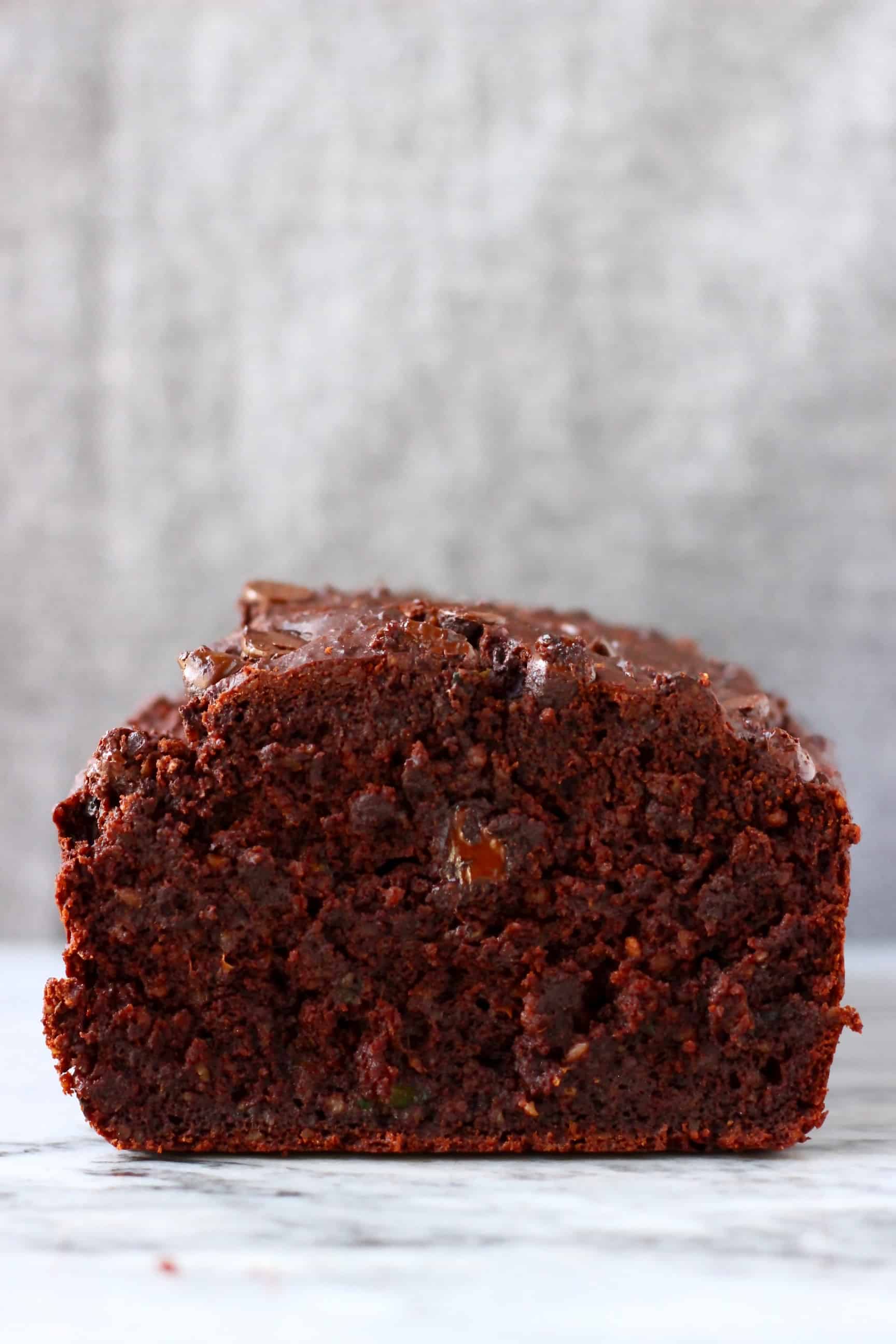 A sliced loaf of gluten-free vegan chocolate zucchini bread