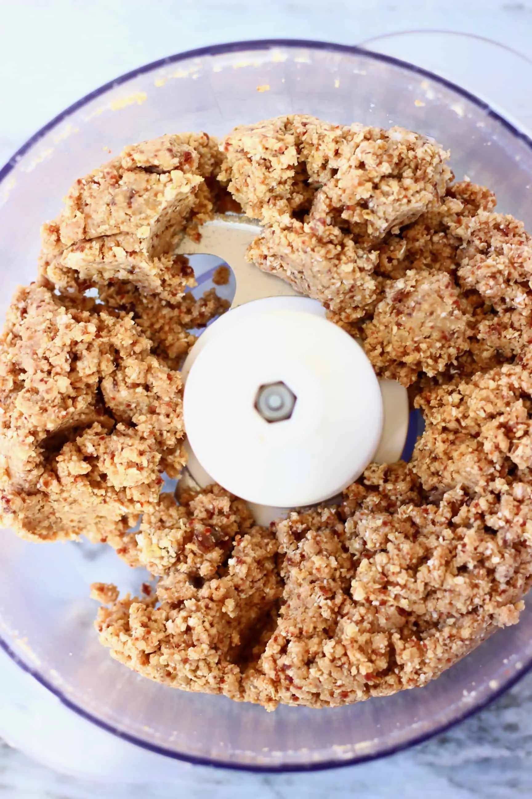 Raw blueberry crisp topping in a food processor