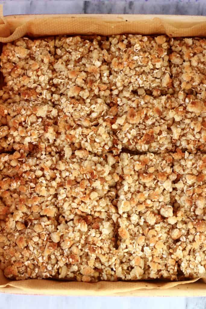 Baked apple pie bars but into 16 pieces in a square baking tin
