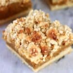 A vegan pumpkin pie bar with crumble topping