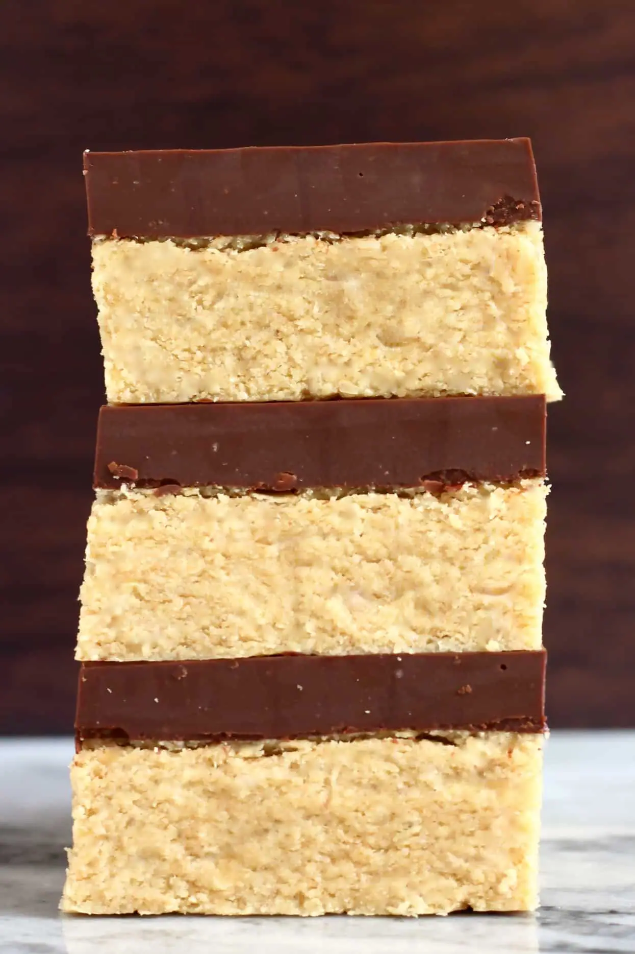 A stack of three chocolate peanut butter bars