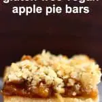 Apple pie bar on a marble slab against a dark brown background