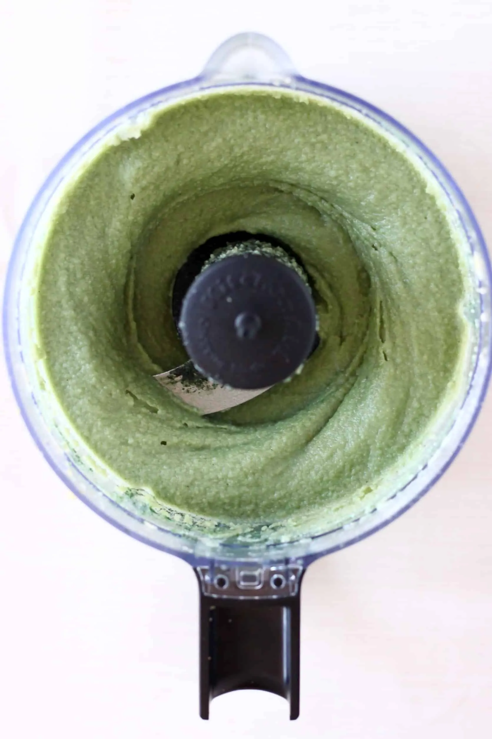 Green blended cashews in a food processor