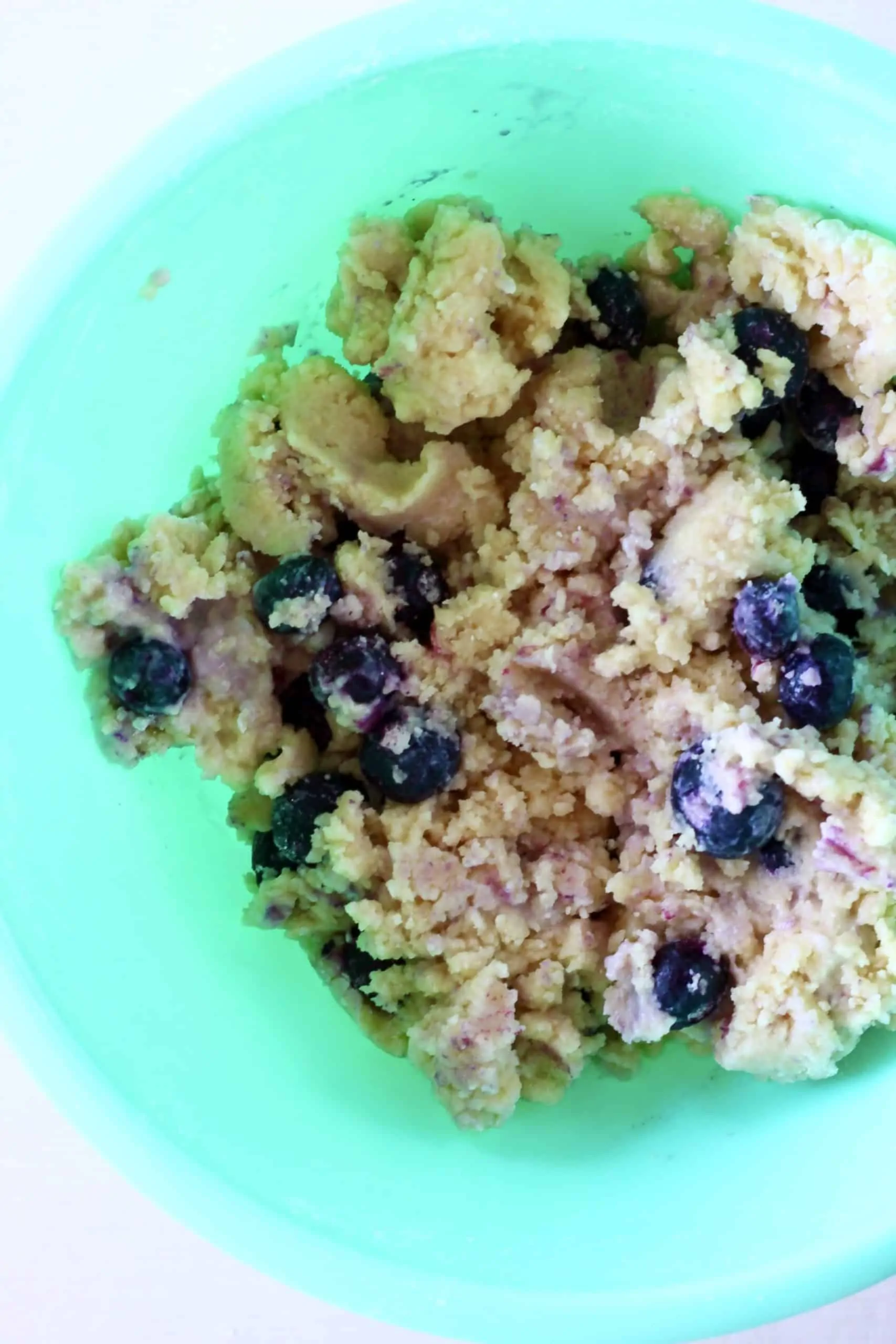 Raw gluten-free vegan lemon blueberry cookie dough in a bowl