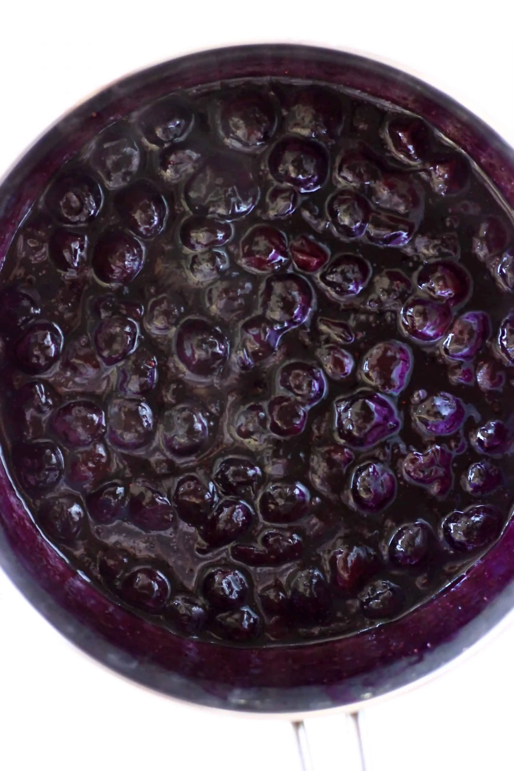 Cooked blueberries in a saucepan