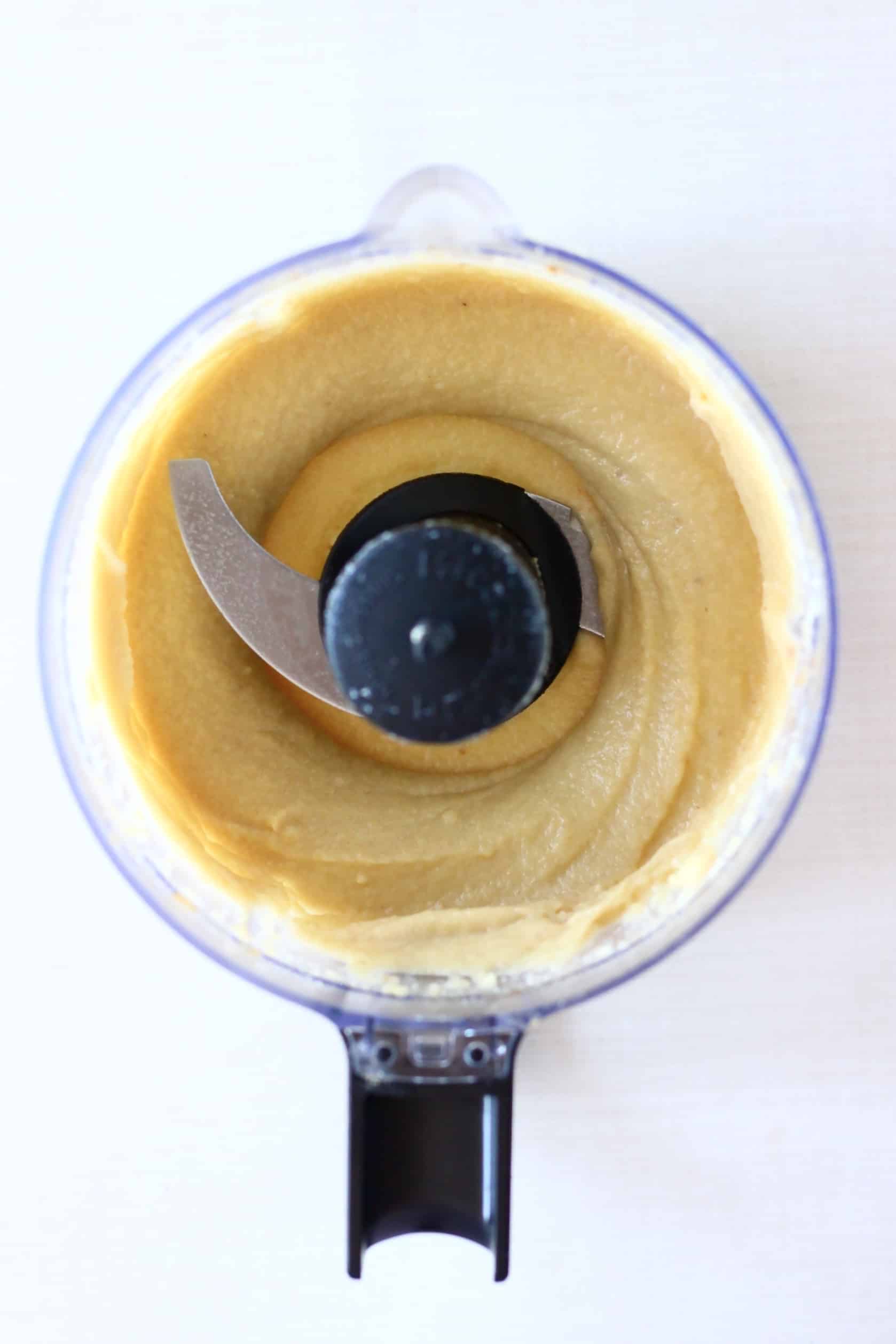 Blended cashews, maple syrup and cacao butter in a food processor
