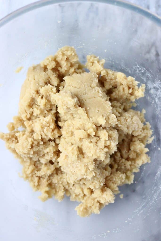 Crumble bar dough in a glass bowl