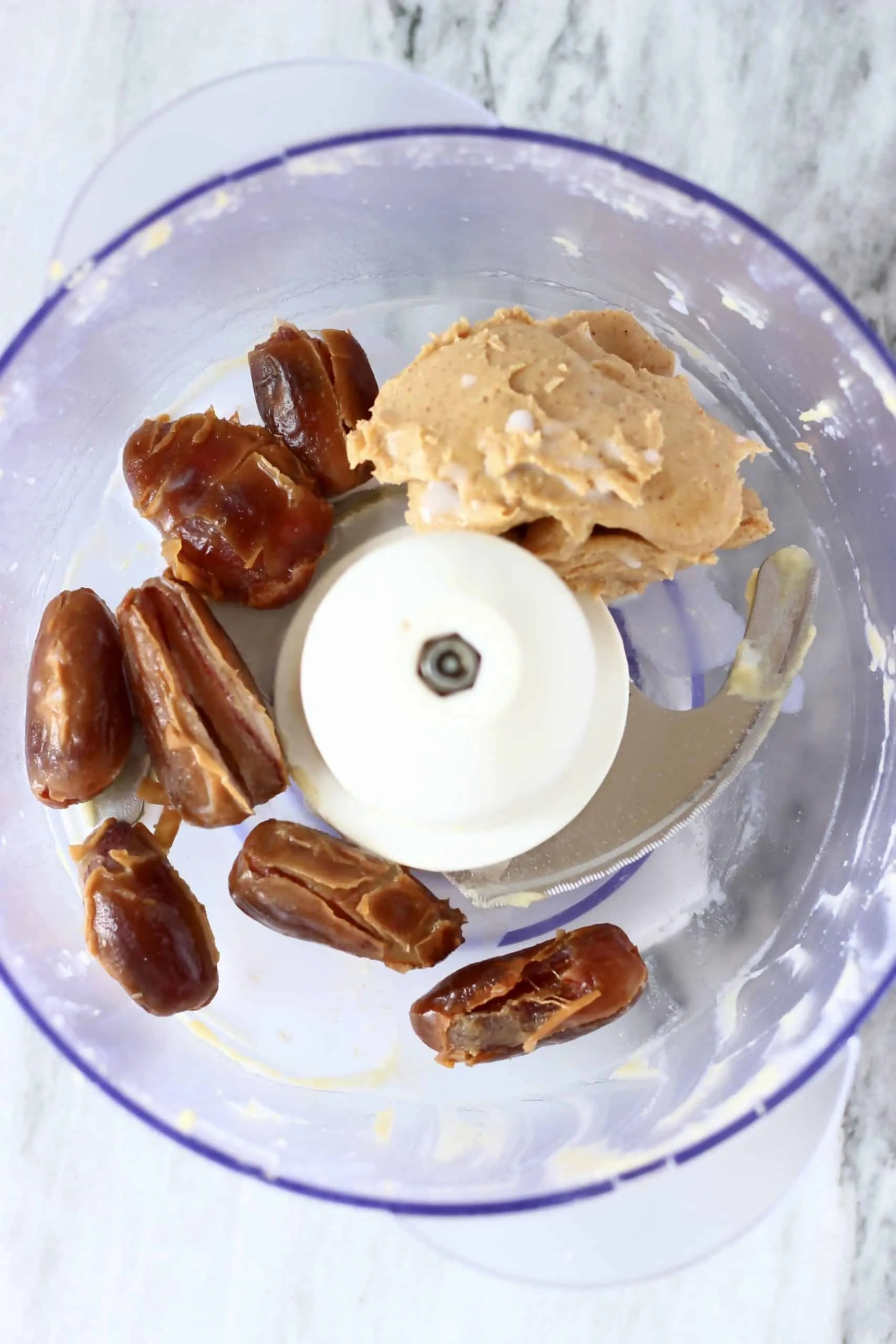 Dates and peanut butter in a food processor