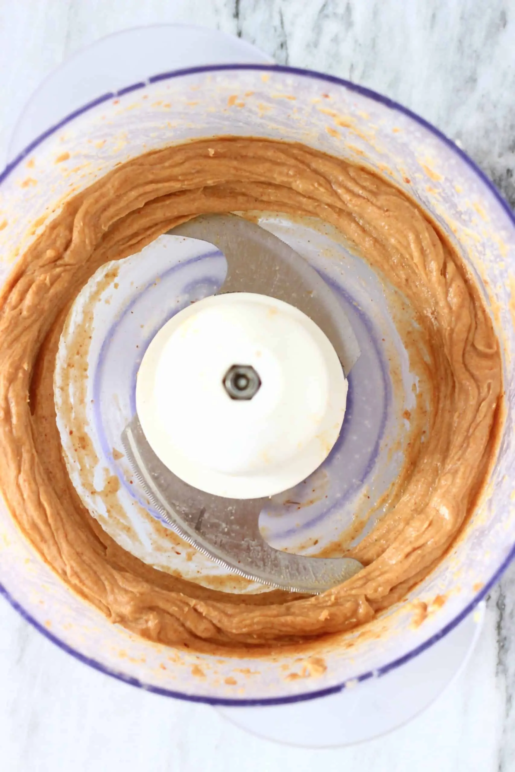 Blended dates and peanut butter in a food processor