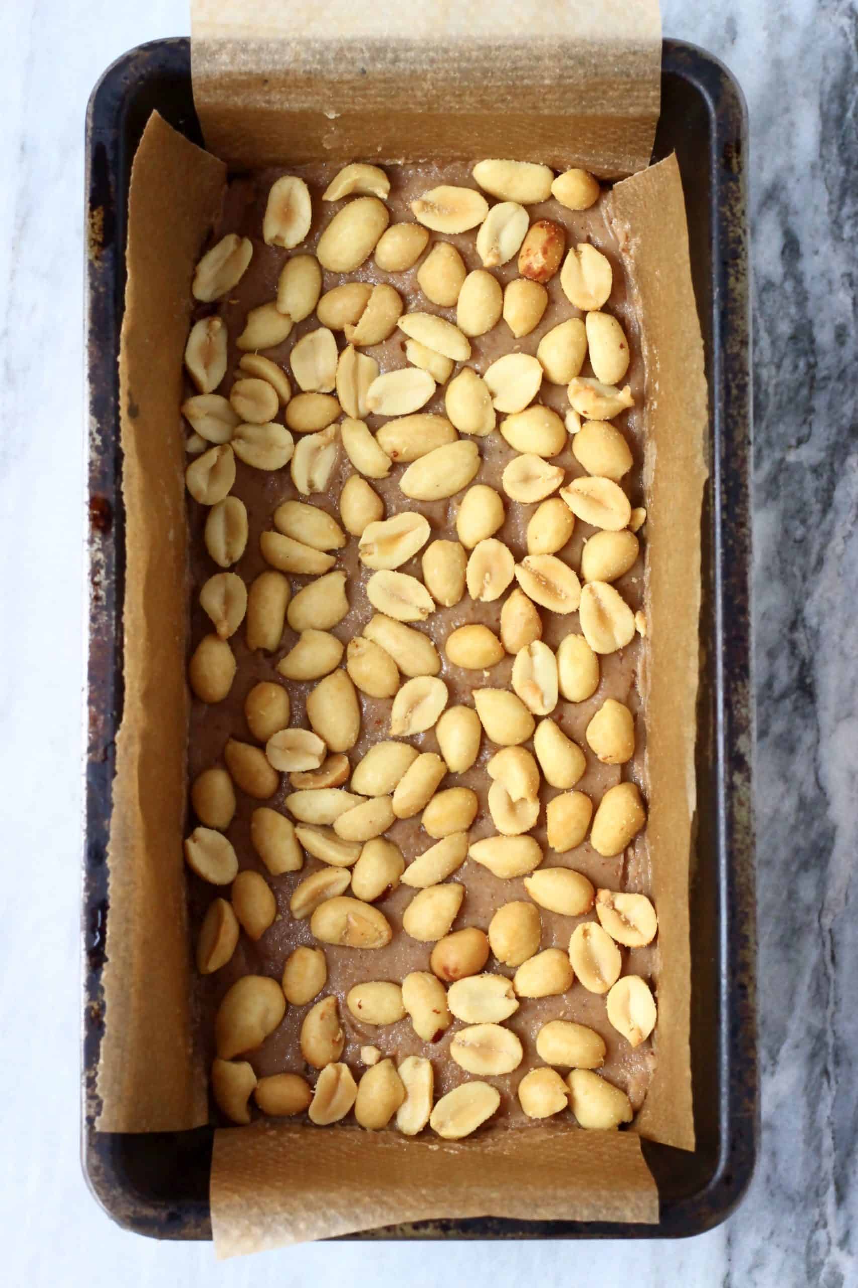 Peanuts pressed into caramel in a loaf tin