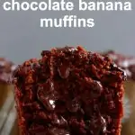 Three chocolate banana muffins one cut in half