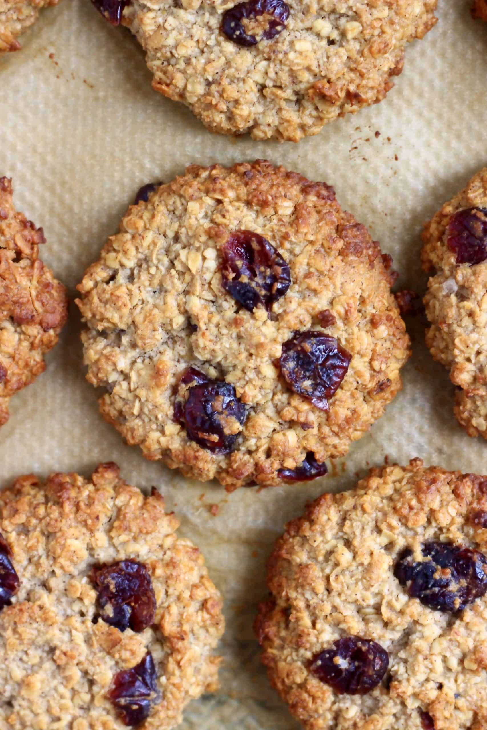Oatmeal cookies with dried cranberries on a baking tray