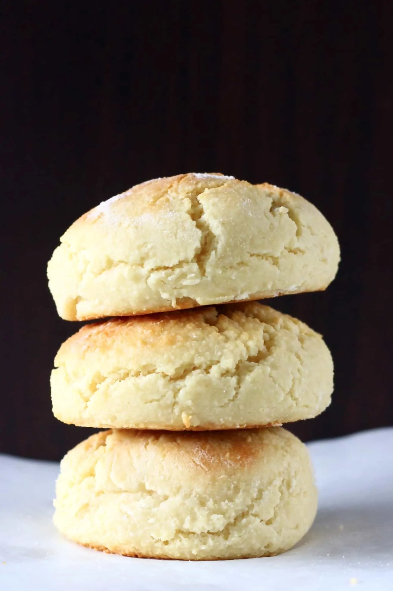Three gluten-free vegan biscuits stacked on top of each other