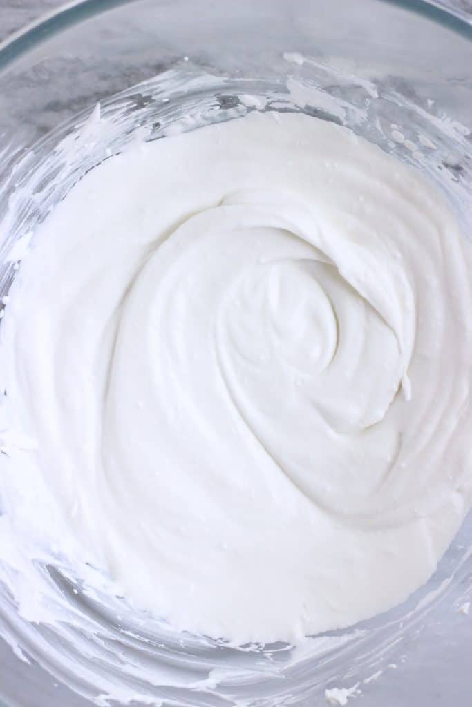 Vegan cream cheese frosting in a glass bowl