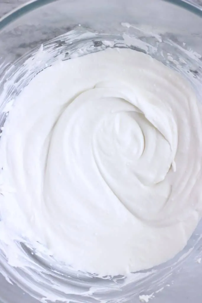 Vegan cream cheese frosting in a glass bowl