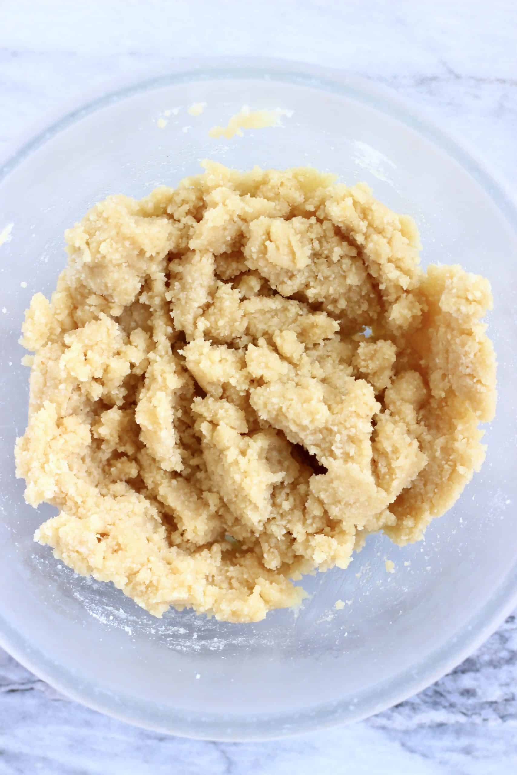 Shortbread cookie dough in a glass bowl