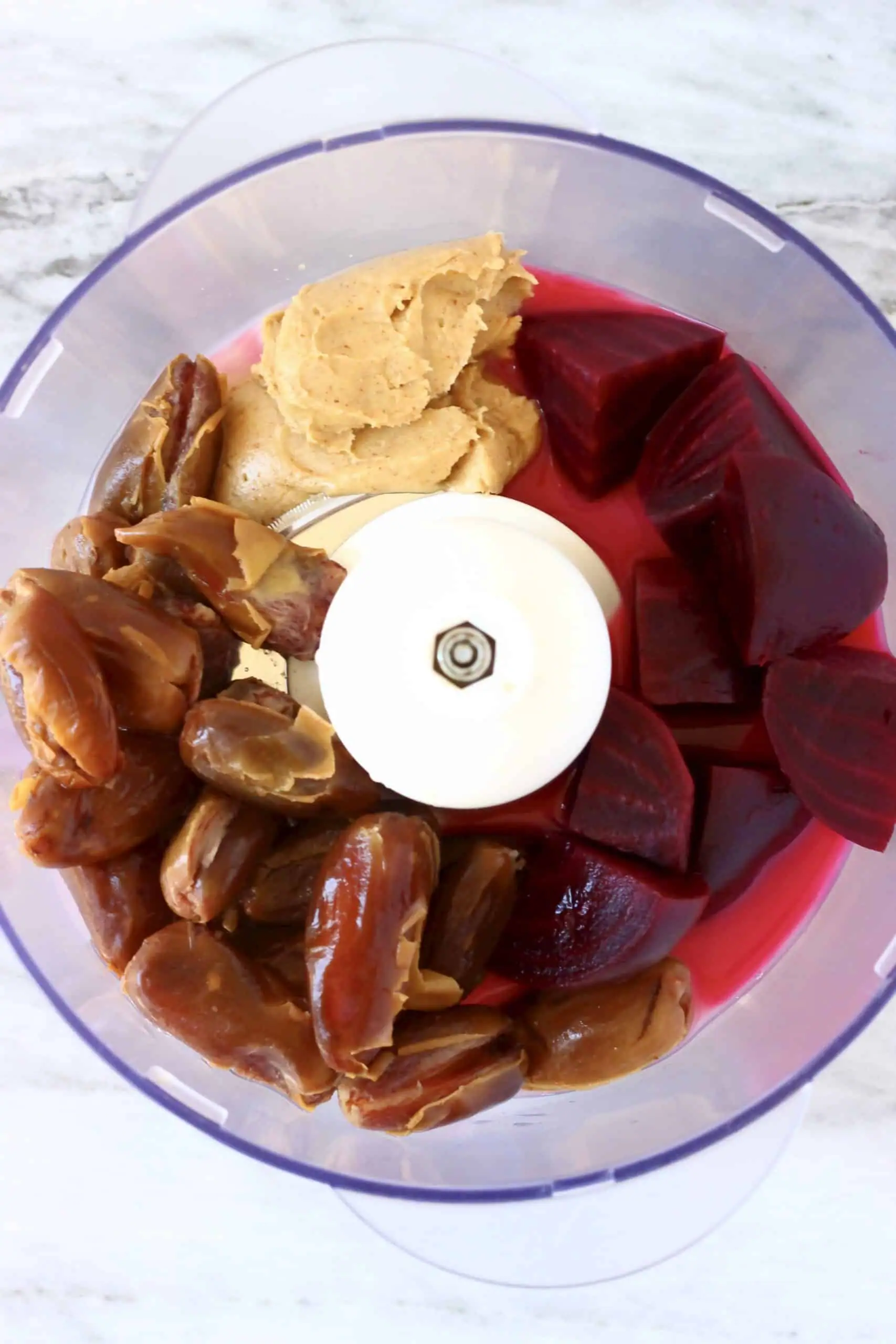 Dates, cooked diced beetroot, almond butter and almond milk in a food processor