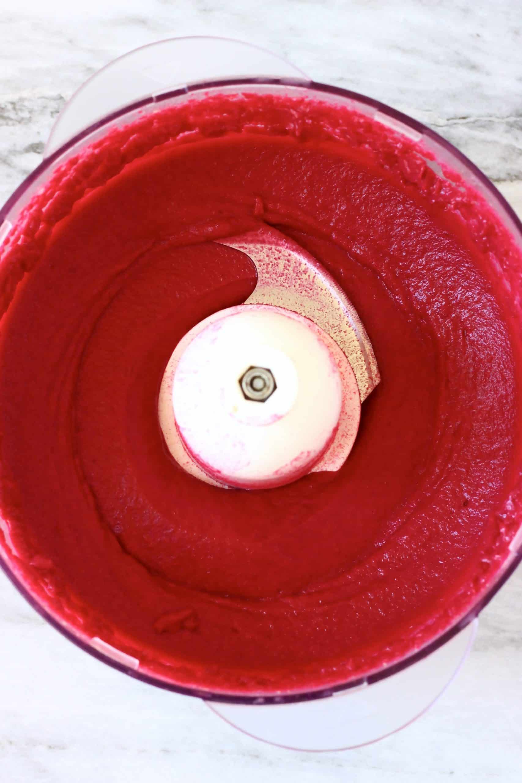 Blended up dates, beetroot, almond butter and almond milk in a food processor