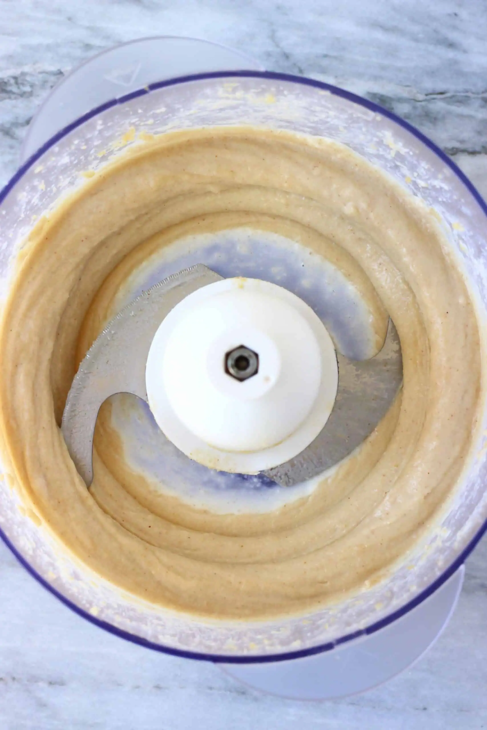 Peanut butter frosting in a food processor