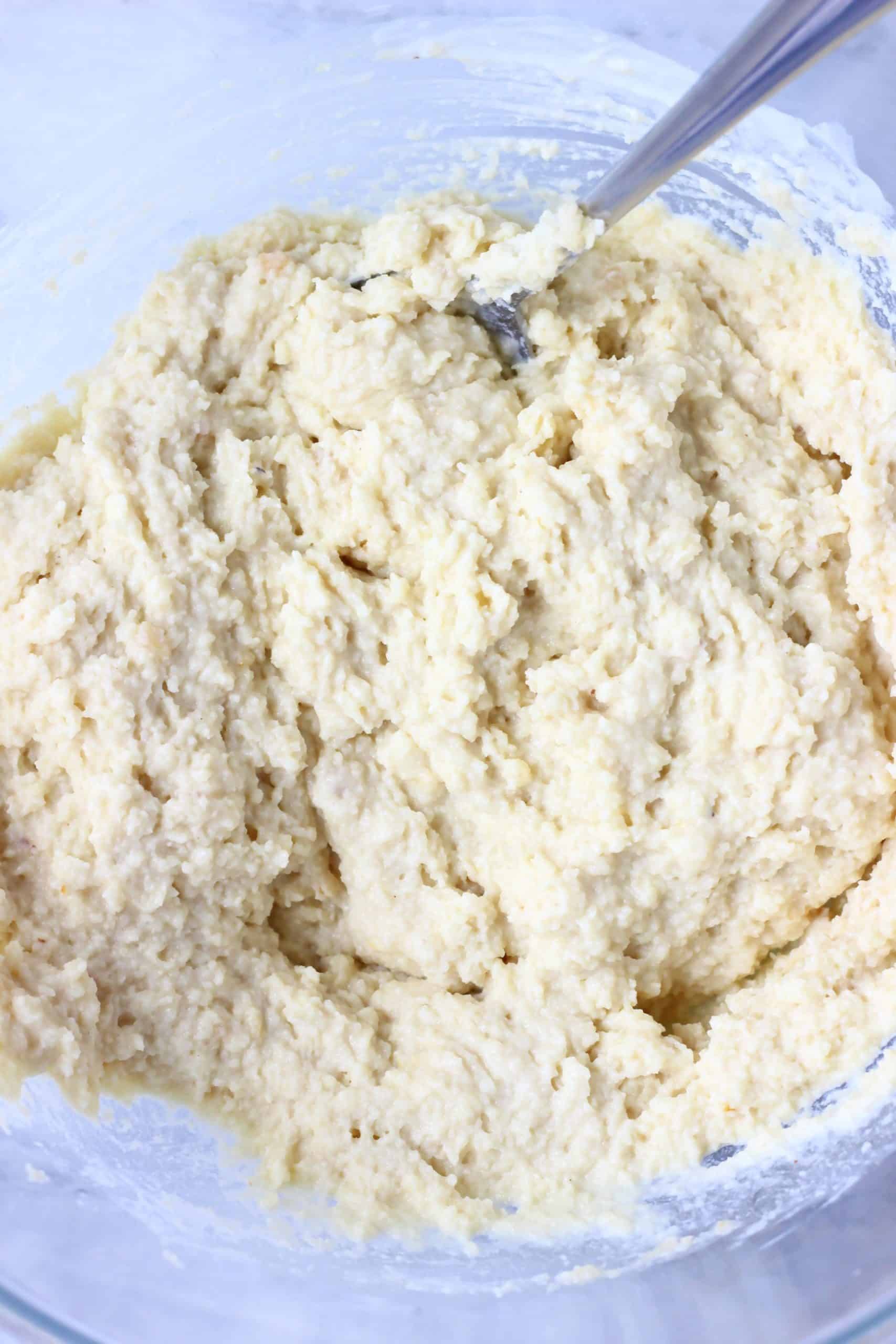 Raw gluten-free vegan orange pound cake batter in a bowl