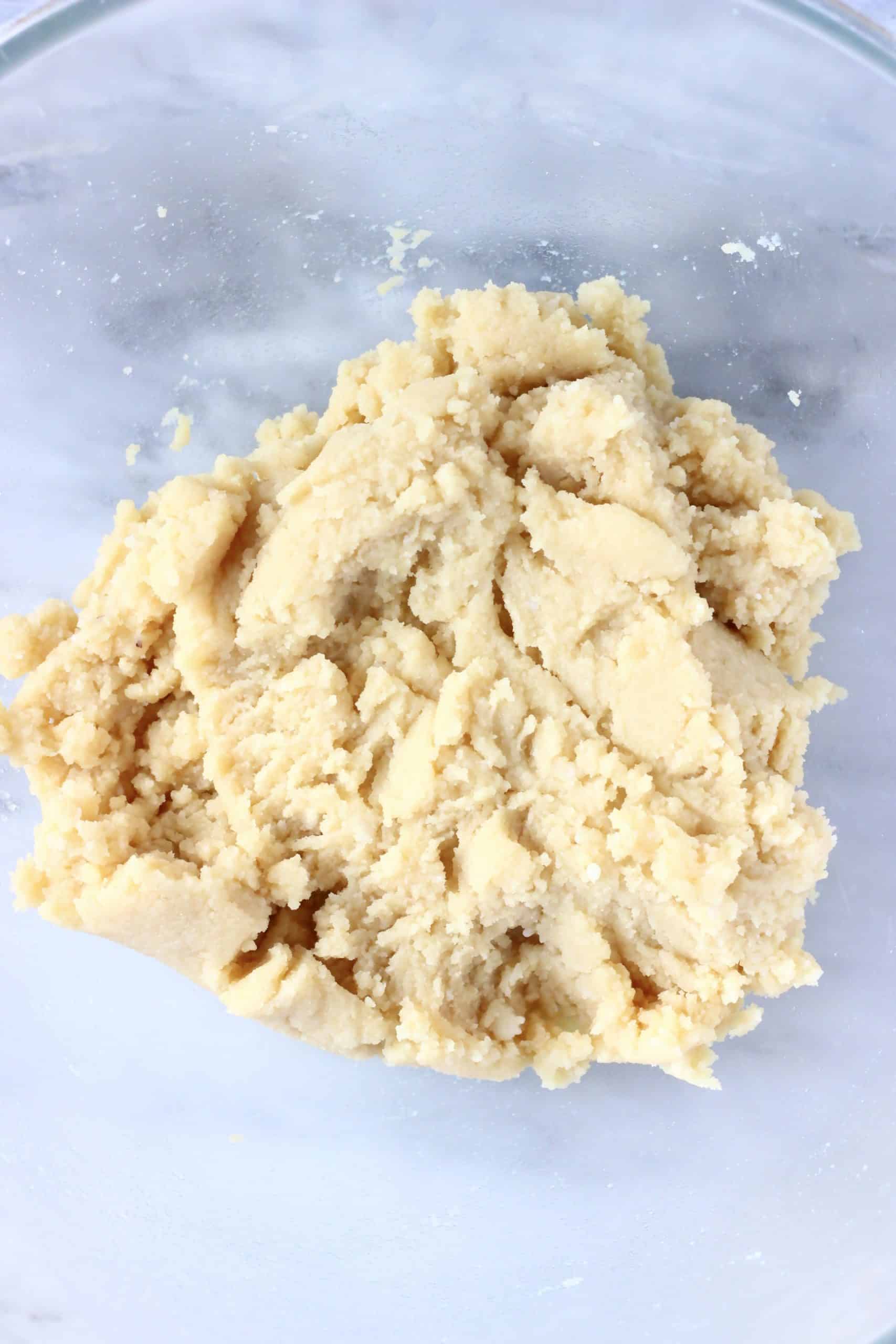 Raw gluten-free vegan thumbprint cookie dough in a bowl
