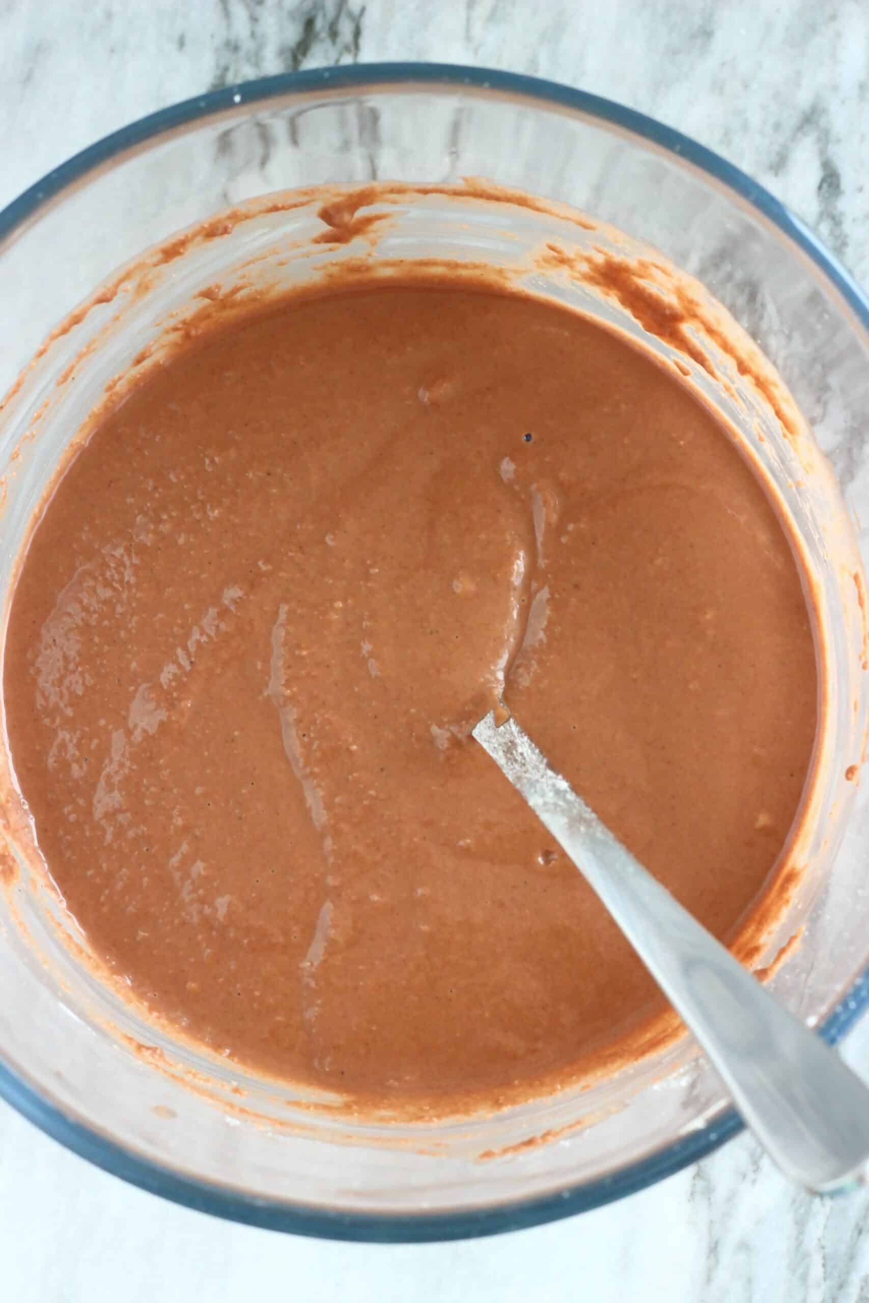 Gluten-free vegan chocolate pancakes batter in a bowl