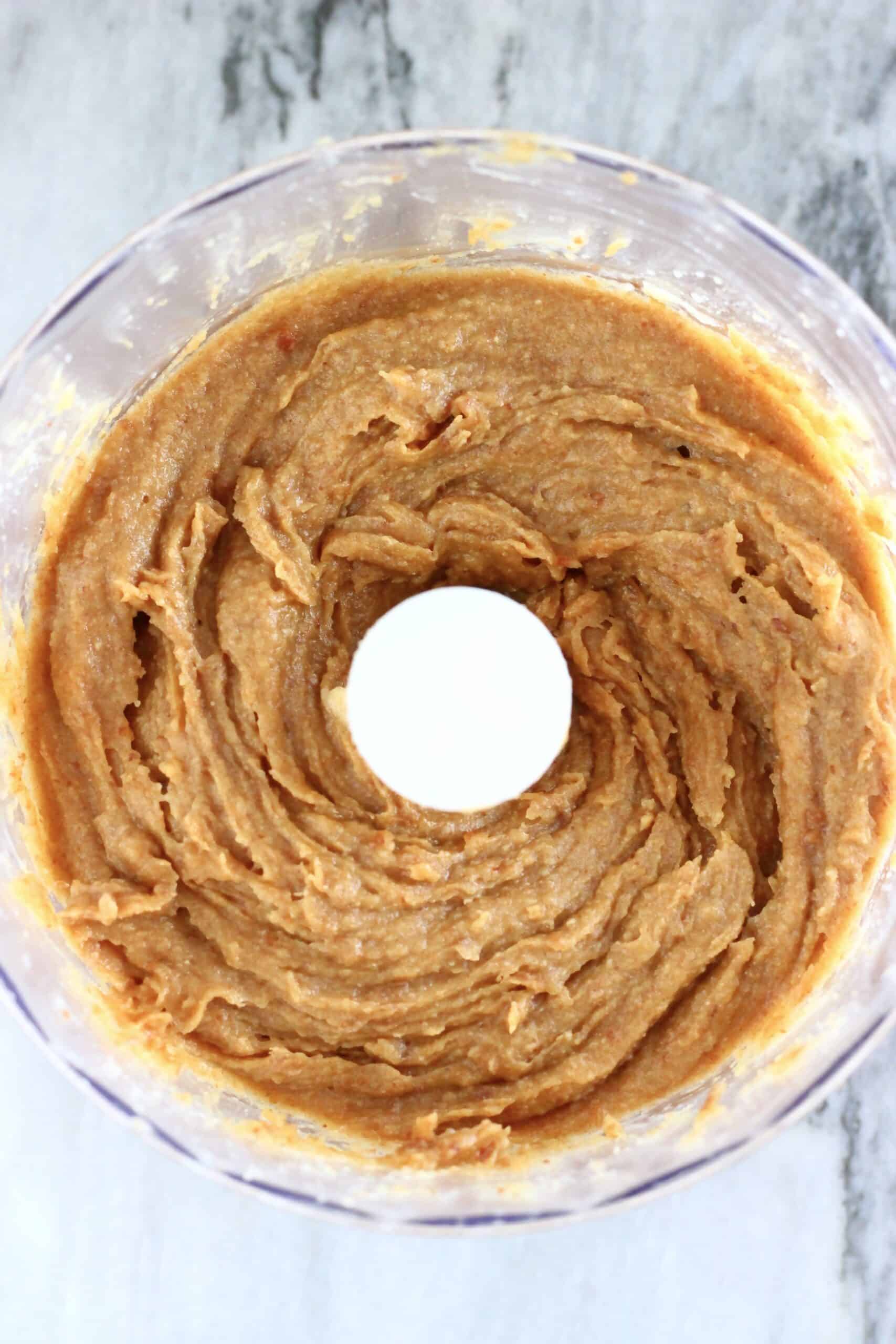 Dates, almond butter, salt and vanilla blended up into a purée in a food processor