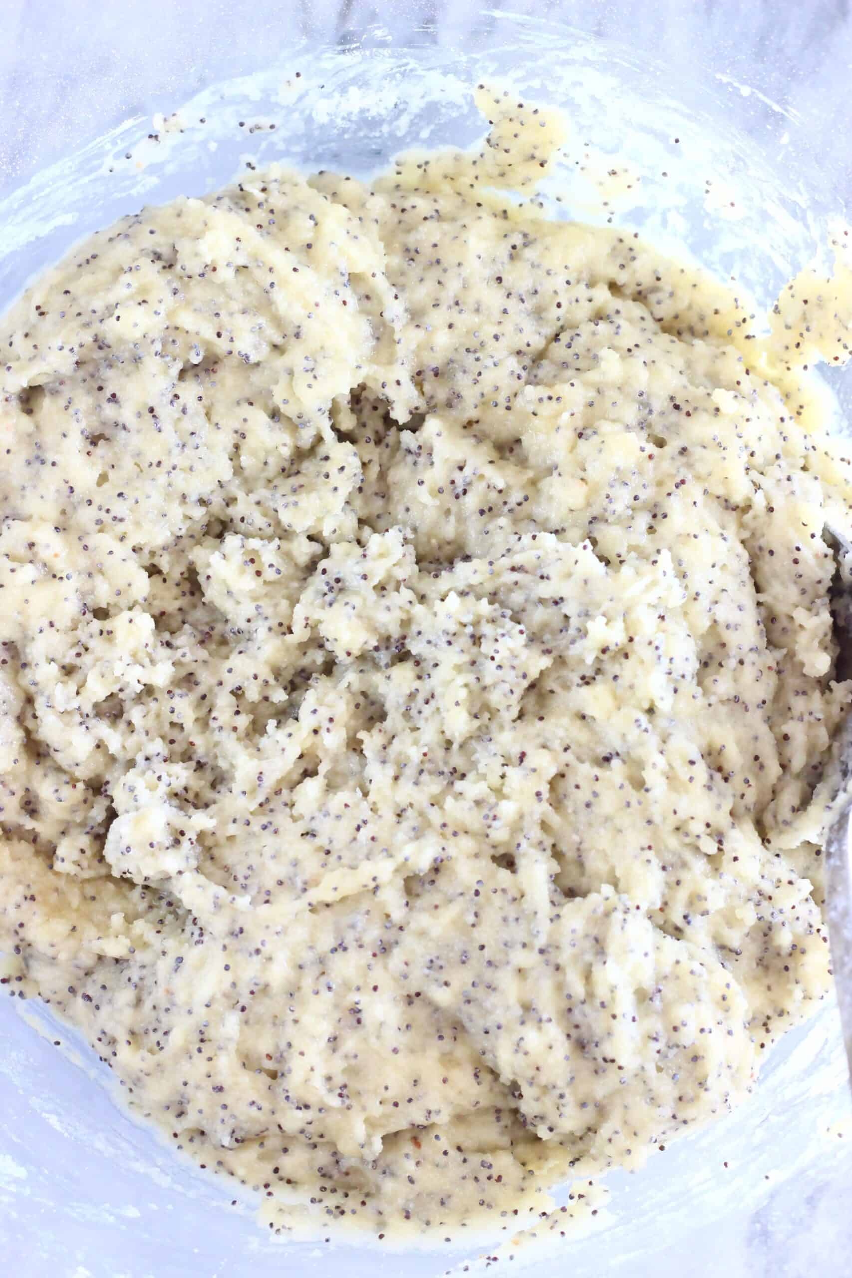 Raw gluten-free vegan lemon poppy seed scones batter in a bowl