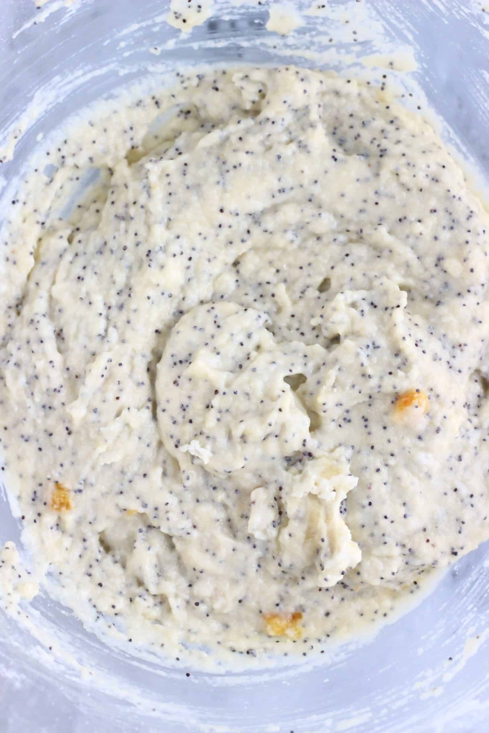 Raw gluten-free vegan orange poppy seed muffin batter in a bowl