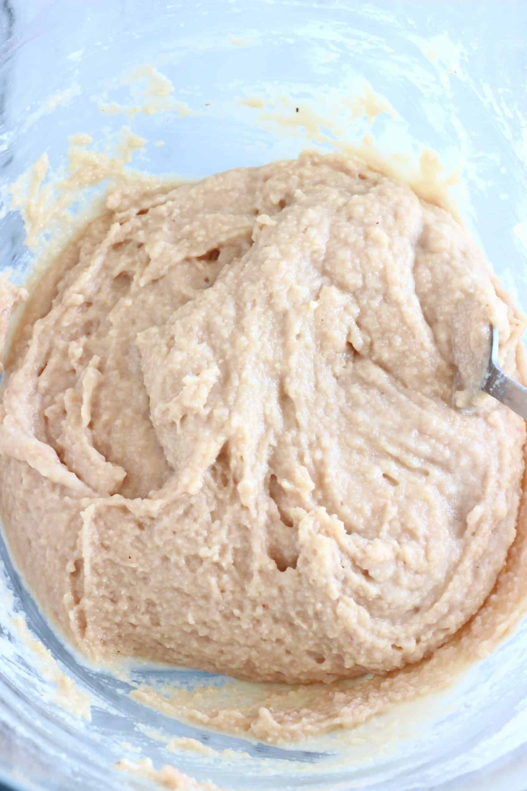 Raw gluten-free vegan blood orange cake batter in a mixing bowl